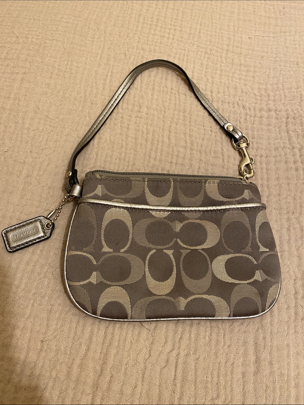 Coach Signature Canvas Wristlet Bag in Gray .